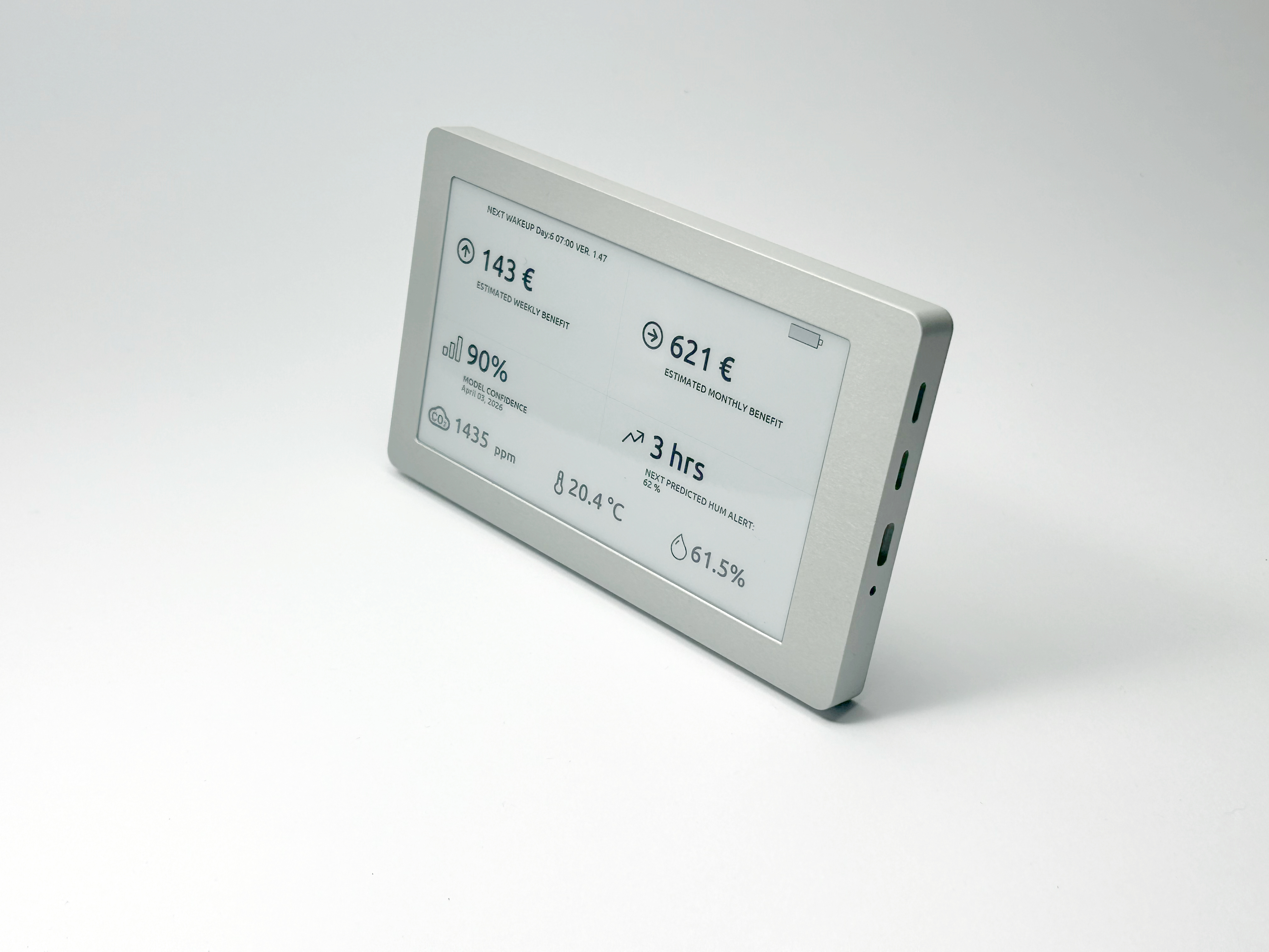 Front view of Sensoria sensor with e-ink display showing model confidence, predicted alerts and current environmental readings